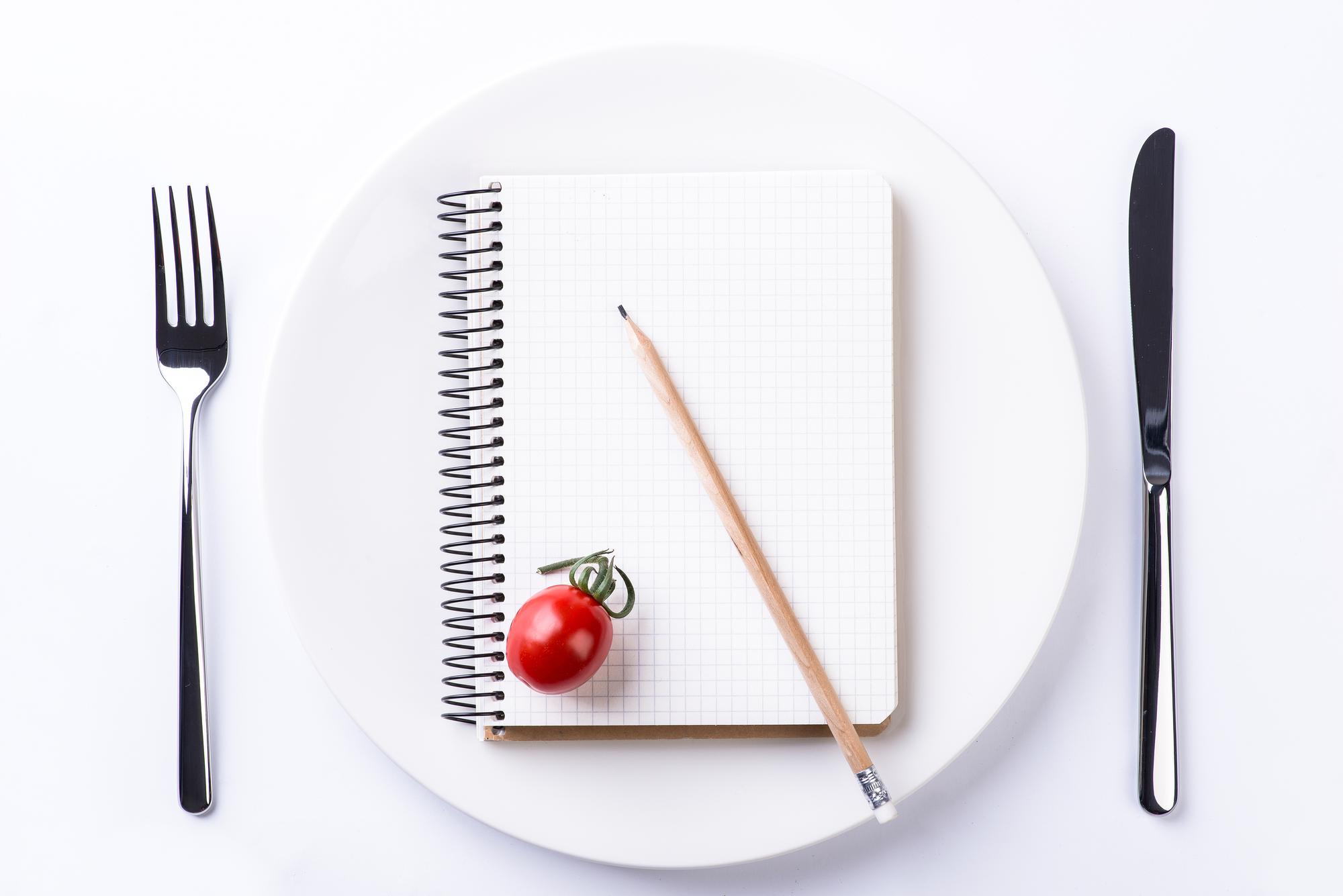 menu engineering notes and plated dishes